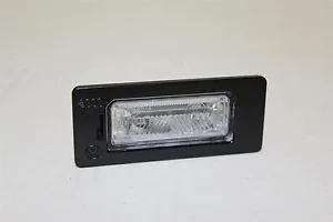 Фонарь подсветки номера VAG A4/FABIA/SUPERB/PASSAB B6 OE