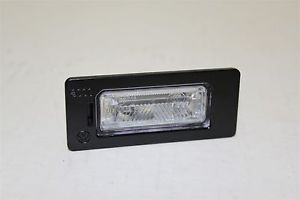 Фонарь подсветки номера VAG A4/FABIA/SUPERB/PASSAB B6 OE