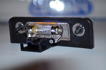 Фонарь подсветки номера SKODA OCTAVIA II OE